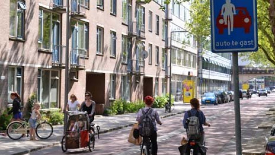 Dutch cycling street - cars are guests Dutch cycling street - cars are guests